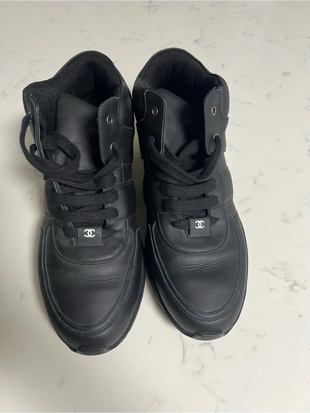 CHANEL Black Men's High-Top Leather Sneakers with Logo Tab